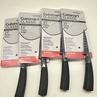 Front view of four sealed Cuisinart paring knives