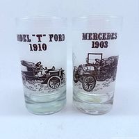 Front view of both glasses showing car illustrations and text