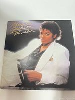 Front cover of Thriller LP showing Michael Jackson portrait