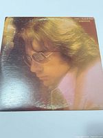 Front of LP sleeve showing overall artwork and wear