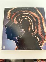 Front cover showing multi-exposure silhouette artwork