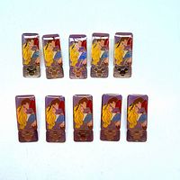 Front view of all 10 identical Sleeping Beauty pins