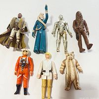 All seven Star Wars figures laid out
