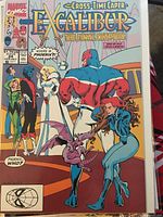 Front cover photo of Excalibur Comic #24 with characters and title visible.