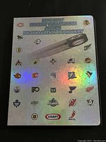 Holographic silver album cover with NHL team logos and Kraft branding