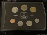 Photo showing seven Canadian coins in a black specimen set holder with Royal Canadian Mint labeling.