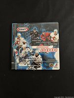 Front cover of the 2000-1 Kraft NHL Hockey Complete Factory Set Collector's Album showing featured players and Kraft branding.