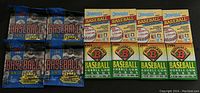 12 unopened packs of baseball cards from 1994 including Topps, Donruss, and Bowman brands.