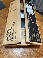 Closed original box with product information and shipping label visible