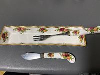 Bone china olive server tray, small fork, and knife with Old Country Roses floral design and gold trim