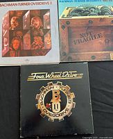 Photo showing three Bachman-Turner Overdrive vinyl record albums: Bachman-Turner Overdrive II, Not Fragile, and Four Wheel Drive.