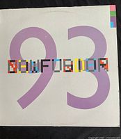 Vinyl record single cover showing "NEW ORDER" text with large purple '93' and colored blocks on a white background.