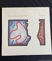 Front cover of the Spandau Ballet True vinyl album showing the album art and title.