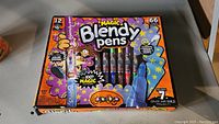 Front view of Crayola Magic Blendy Pens box showing 12 color pens, blender pen, and colorful packaging
