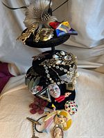 Tiered display stand showing all pins spread across three levels