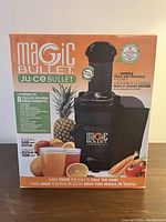 Closed original box packaging for Magic Bullet Juice Bullet juicer, showing brand, product image, motor wattage, and product benefits.