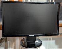 Front view of Samsung 23-inch widescreen LCD monitor on stand showing screen and bezel.