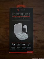 Front view of sealed Helix Pod Wireless High Fidelity Earbuds package showing earbuds and charging case image with key features.