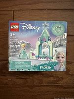Front of the sealed LEGO Disney Frozen Elsa's Castle Courtyard set box showing product image and branding.