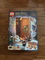 Front of the sealed LEGO Harry Potter Hogwarts: Transforming Classrooms box showing set number 76382, age recommendation 8+, and 241 pieces. Features minifigures of Harry Potter, Professor McGonagall, and Hermione Granger with magical elements.
