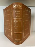 Front cover and spine leather binding with gilt lettering and decoration