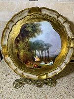 Front view of the Florentine decoupage wood tray showing detailed scenic scene and gold scalloped frame