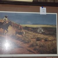 Framed print showing more of the western landscape artwork including cowboy and cattle herd from a wider angle.