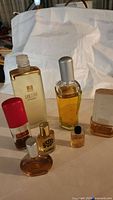 Photo showing most of the vintage perfume bottles - front view