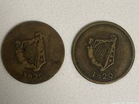 Front view of the two tokens showing the harp side with ten strings and the year 1820.
