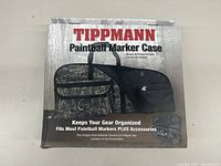 Photo of the Tippmann Paintball Marker Case box showing product image and branding.