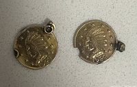 Obverse side of two 1923 Indian Head gold coins with soldered loops
