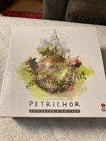 Front cover of the Petrichor Collector's Edition board game box showing the artwork and title.