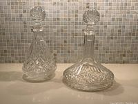 Pair of Waterford Lismore crystal decanters with stoppers, front view