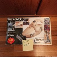 Front view of the Shark UltraTurbo hand vacuum box with product image and features.