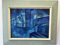 Full front view of framed abstract cubist oil painting in blue tones