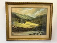 Full-frontal view of framed watercolor landscape showing overall composition
