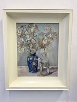 Frontal view of the framed painting