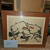 Overall image of the framed artwork showing four dancing figures in a circle under brown matting and gold frame.