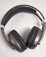 Top view showing padded headband and ear cushions of wired headphones