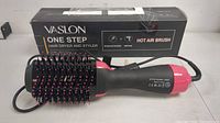 Front view of the VASLON One Step Hot Air Brush hair dryer and styler showing bristles and handle.