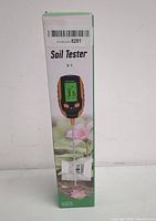 Original boxed packaging of the Soil Tester 5-in-1 with image of the product and flowers, showing the brand and model number 5-1.