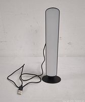 Front view of Monster Illuminessence flow light bar showing frosted diffuser panel and attached USB cable.