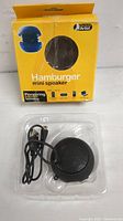 Photo of hamburger mini speaker in original yellow box, wire and plastic tray visible.