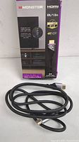 Boxed Monster HDMI Cable packaging showing brand, length 6ft/1.8m, HDMI 2.1 and 4K HDR support.