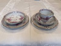 Two stacks showing cup on saucer on plate and separate saucer on plate
