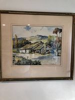 Full view of chromolithograph painting with original frame, showing a landscape and theater building.