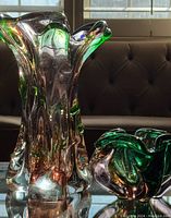 Vase and bowl paired, showing shape and color under natural light