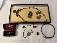 Overview of ten-piece lot on flat surface