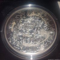 Close-up of reverse showing intricate abstract design and proof finish