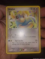 Front of the Dratini Pokémon card showing the character, HP, moves, and basic card information.